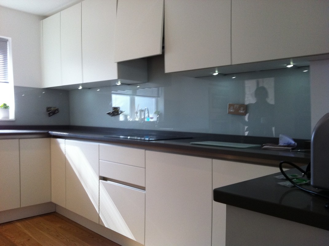 Grey glass kitchen splashback with LED lighting in Uxbridge
